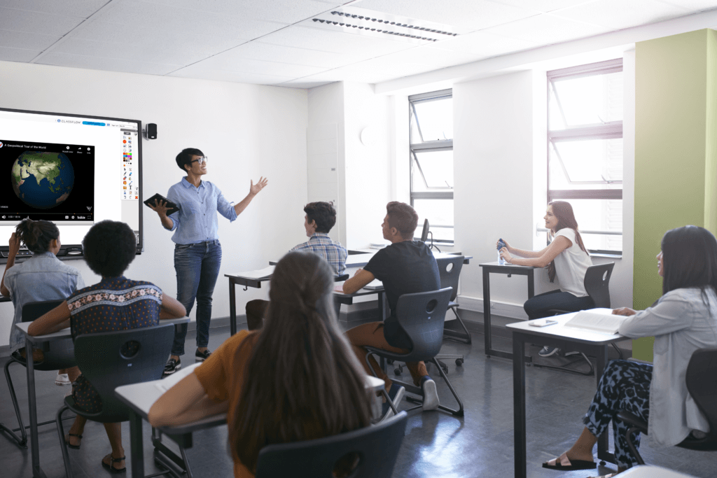 Teacher in front of classroom teaching with ActivInspire on the ActivPanel