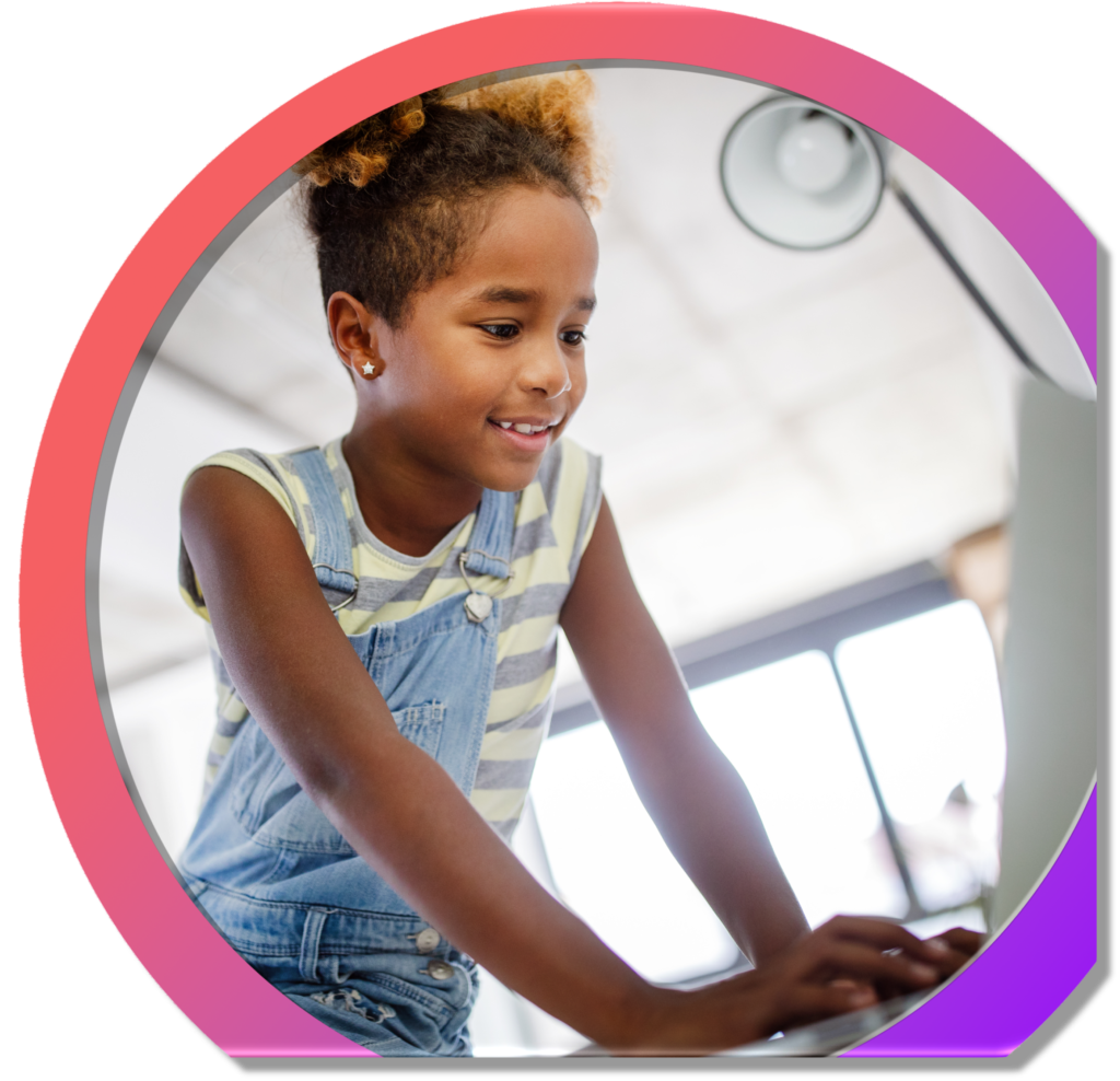 Black female student in front of a laptop computer