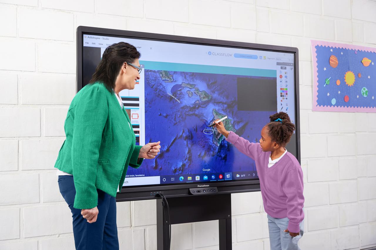 This image shows a student and teacher collaborating in a history lesson on the Promethean ActivPanel.