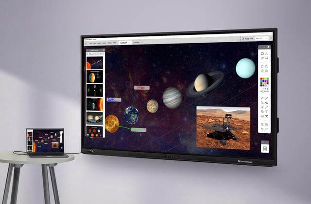 A Promethean Board and laptop share matching ActivInspire Screens.